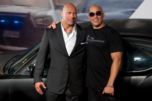 Dwayne Johnson and Vin Diesel pose for photographers during the premiere of the movie Fast and Furious 5 in Rio de Janeiro, Brazil.