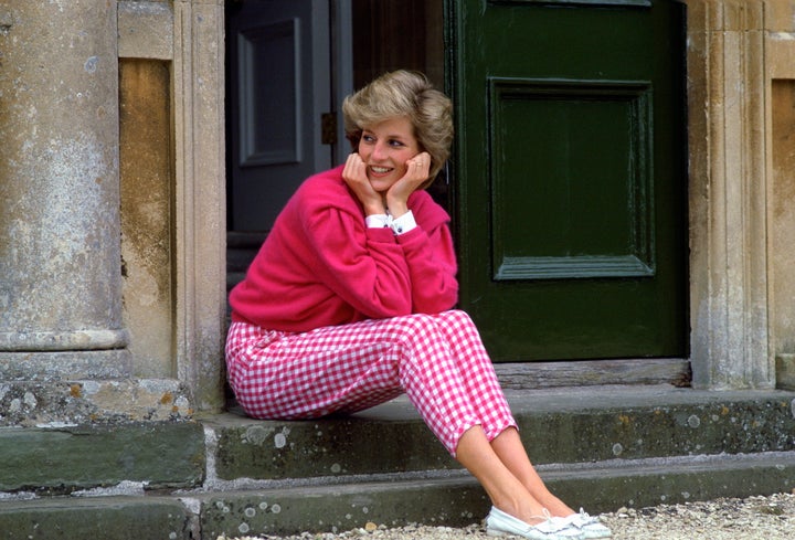 Princess Diana wears pink gingham trousers at home in Highgrove in July 1986.