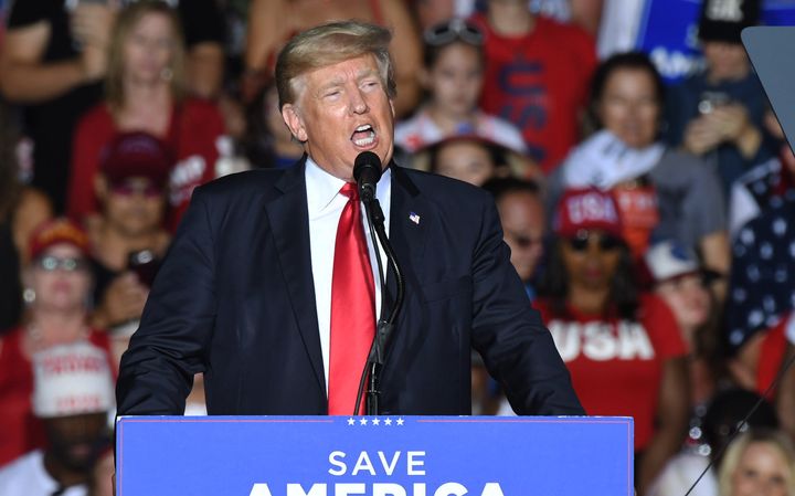 Former President Donald Trump speaks in July at a rally at the Sarasota Fairgrounds in Florida. Many Republicans are still beholden to him even though he's been out of the White House for months.