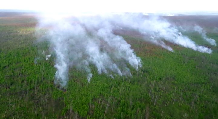 A view of a wildfire from a helicopter in Yakitua on July 22, 2021.