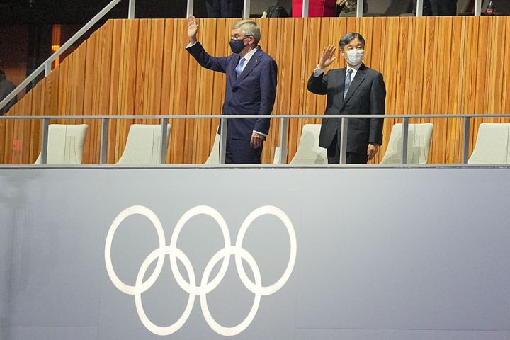 23 July 2021, Japan, Tokio: Olympics: Opening ceremony at the Olympic Stadium. Thomas Bach (l) from Germany, President of the International Olympic Committee (IOC), stands next to the Japanese Emperor Naruhito. Photo: Michael Kappeler/dpa (Photo by Michael Kappeler/picture alliance via Getty Images)