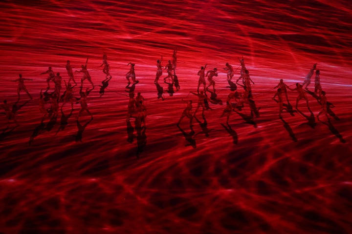 TOKYO, JAPAN - JULY 23: Performers dance during the Opening Ceremony of the Tokyo 2020 Olympic Games at Olympic Stadium on July 23, 2021 in Tokyo, Japan. (Photo by Maja Hitij/Getty Images)