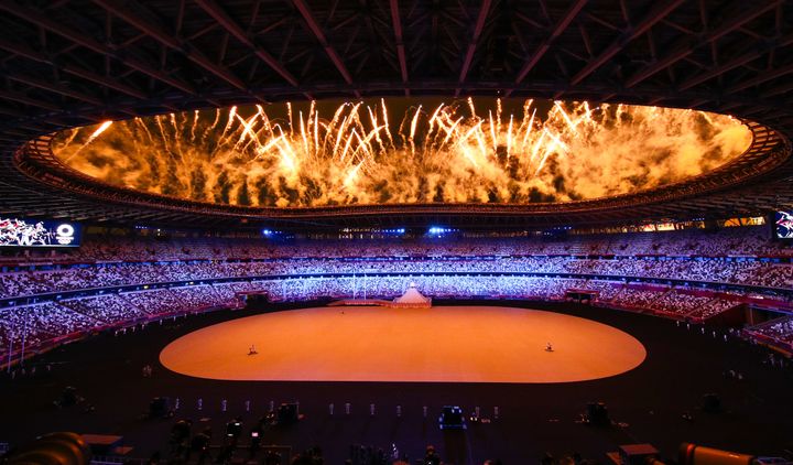 TOKYO, JAPAN JULY 23, 2021: Fireworks go off over the National Stadium at the opening ceremony of the Tokyo 2020 Summer Olympic Games. Tokyo was to host the 2020 Summer Olympics from 24 July to 9 August 2020, however because of the COVID-19 pandemic the games have been postponed for a year and are due to take place from 23 July to 8 August 2021. Sergei Bobylev/TASS (Photo by Sergei Bobylev\TASS via Getty Images)