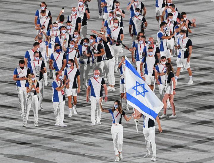 Israel's delegation enters the Olympic Stadium in Tokyo.