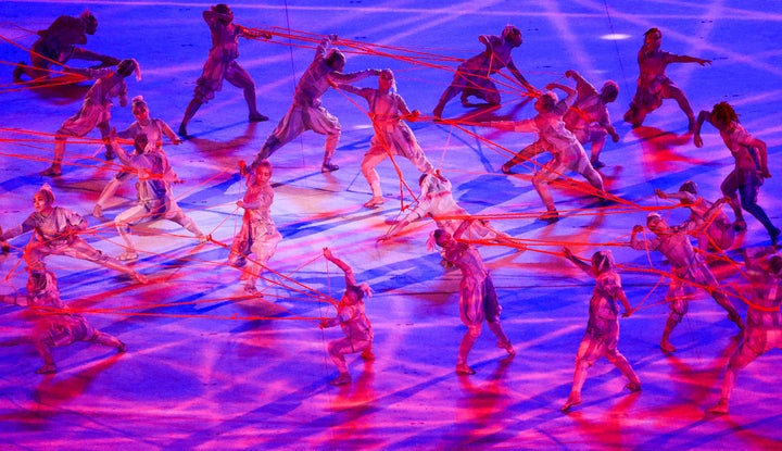 Performers at the opening ceremony of the Tokyo 2020 Summer Olympic Games at the National Stadium. T