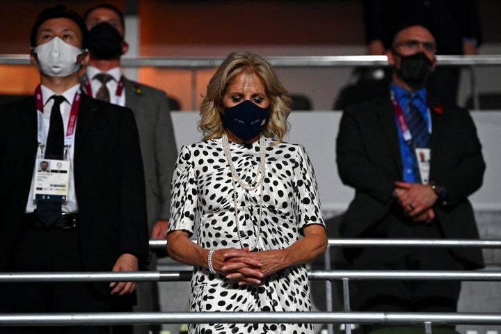 Jill Biden takes part in a moment of silence at the opening ceremony.