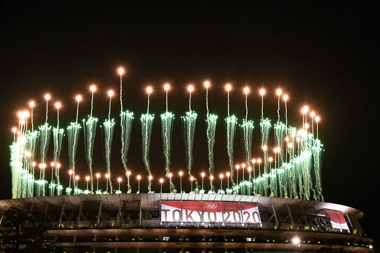Fireworks light up the sky over the Olympic Stadium.