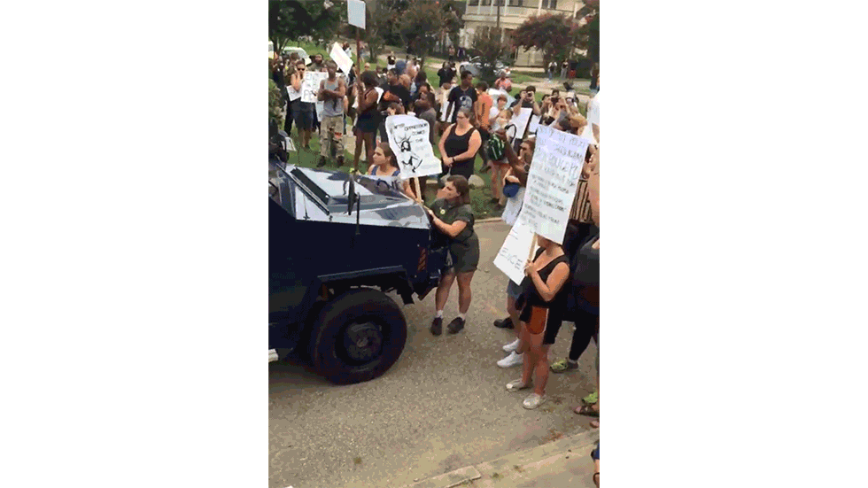 Officers push protesters with an armored vehicle at a July 10, 2016 protest of Alton Sterling’s killing in Baton Rouge, Louisiana. Footage by reporter <a href="https://twitter.com/rebekahallen/" target="_blank" role="link" class=" js-entry-link cet-external-link" data-vars-item-name="Rebekah Allen" data-vars-item-type="text" data-vars-unit-name="6101967be4b000b997dd9429" data-vars-unit-type="buzz_body" data-vars-target-content-id="https://twitter.com/rebekahallen/" data-vars-target-content-type="url" data-vars-type="web_external_link" data-vars-subunit-name="article_body" data-vars-subunit-type="component" data-vars-position-in-subunit="7">Rebekah Allen</a>.