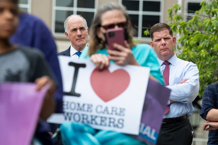 Secretary of Labor Marty Walsh, right, and Sen. Bob Casey (D-Pa.) attend the Care Can't Wait rally with the Service Employees International Union at the Lehigh County Courthouse in Allentown, Pennsylvania, on June 2, 2021.