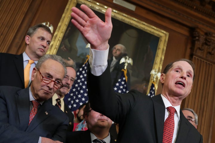 Sens. Ron Wyden (D-Ore.) and Chuck Schumer (D-N.Y.) lead a rally ahead of a House vote on health care and prescription drug legislation on May 15, 2019.