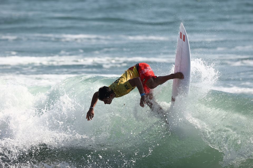 Lucca Mesinas of Team Peru surfs during the Men's Round 1 heat on day two of on July 25, 2021 in Ichinomiya,...