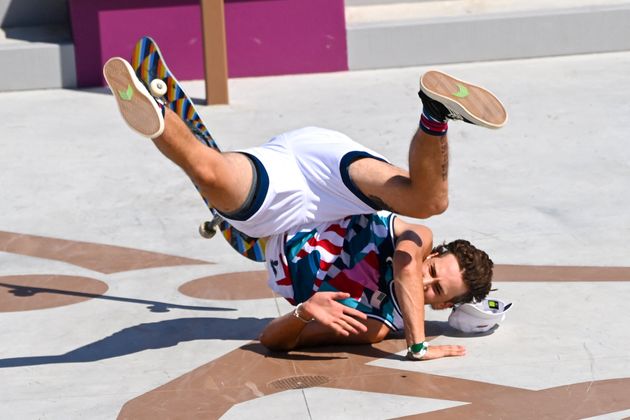 Jagger Eaton of the US takes a fall as he competes in the men's street prelims heat 1.