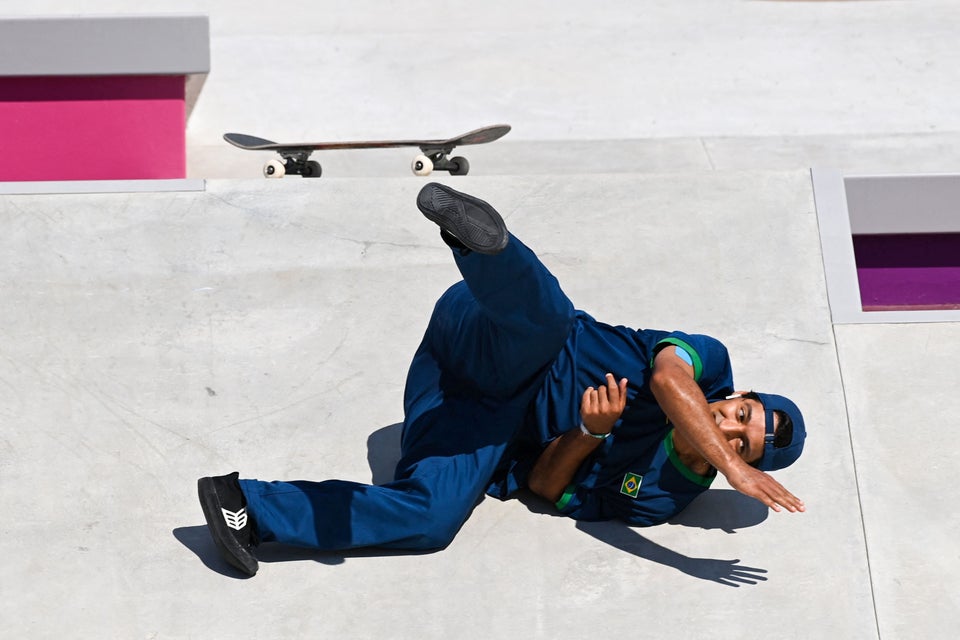 Brazil's Kelvin Hoefler takes a fall as he competes in the men's street prelims heat