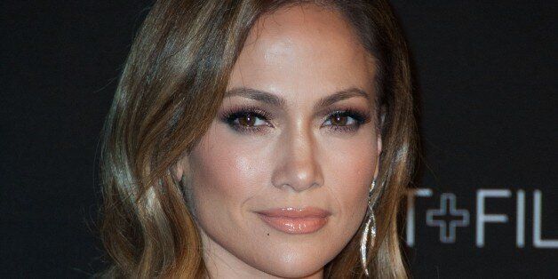 Actress-singer Jennifer Lopez arrives for the 2014 LACMA Art + Film Gala honoring film director Quentin Tarantino and artist Barbara Kruger in Los Angeles on November 1, 2014. AFP PHOTO / Valerie Macon (Photo credit should read VALERIE MACON/AFP/Getty Images)