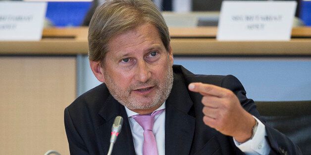 European Union Commissioner designate for Neighbourhood Policy and Enlargement Negotiations Johannes Hahn, of Austria, speaks at the European Parliament's Committee on Foreign Affairs at the European Parliament in Brussels on Tuesday, Sept. 30, 2014. (AP Photo/Thierry Monasse)