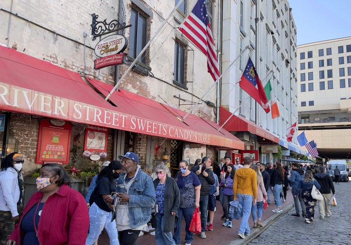 Tourists enjoy downtown Savannah, Georgia on March 3 amid the COVID-19 pandemic. Savannah, which was the first Georgia city to impose a mask mandate last year, dropped its mask mandate in May.