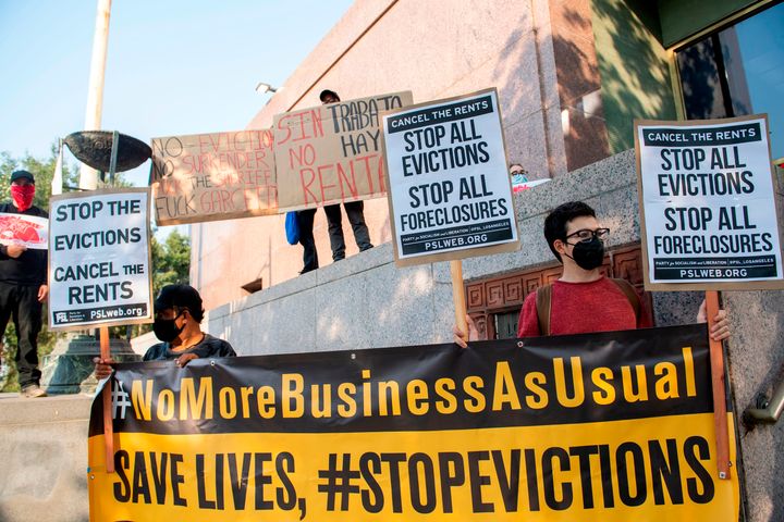 Renters and housing advocates protest to cancel rent and stop evictions amid the coronavirus pandemic on Aug. 21, 2020, in Los Angeles.