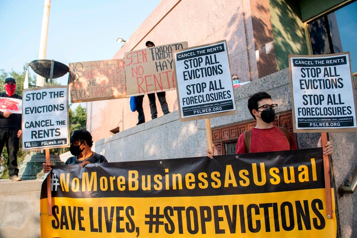 Renters and housing advocates protest in favor of canceling rent and stopping evictions on Aug. 21, 2020, in Los Angeles.