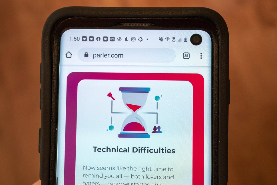 Mobile device showing the conservative Parler website with a statement about "Technical Difficulties" following the app's rem