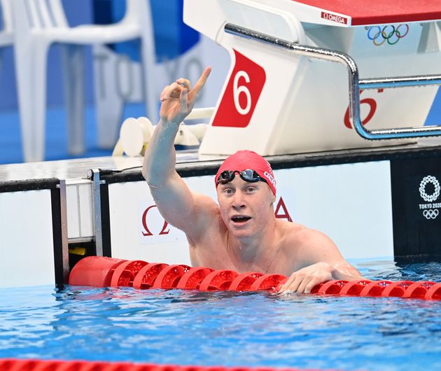 Tom celebrates winning gold at Tokyo Aquatics Centre