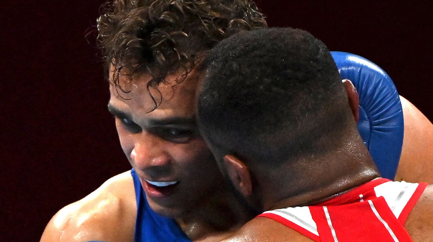 Boxer Channels Mike Tyson With Attempted Ear Bite: 'Olympic-Sized Chomp'