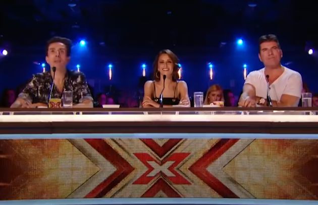 De gauche à droite: Nick Grimshaw, Cheryl Cole et Simon Cowell, jury de la saison 12 de 