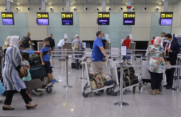 Des passagers attendent d'embarquer sur un vol Air France, à Paris, le 1er juin 2021