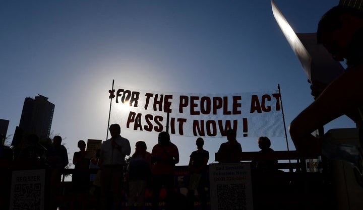 Activists from various grassroots organizations rally outside City Hall in Los Angeles on July 7 to call on Congress and Sen. Dianne Feinstein (D-Calif.) to remove the filibuster and pass the For the People Act to expand voting rights.