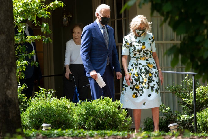 Joe and Jill Biden exit the home of former U.S. President Jimmy Carter on April 29, 2021, in Plains, Georgia.