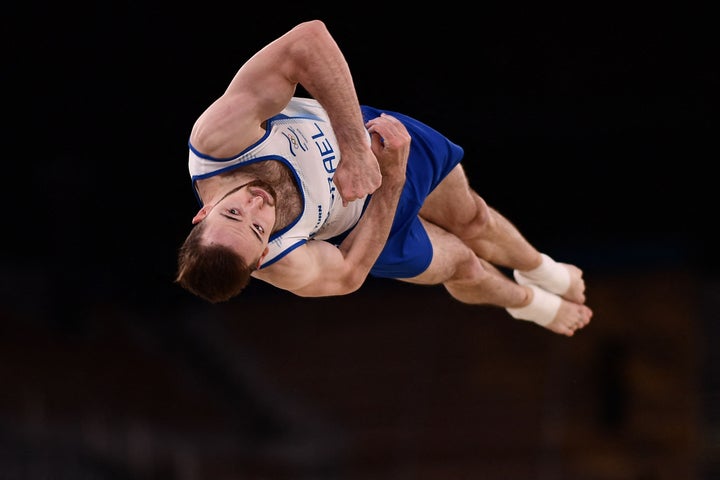 Israel's Artem Dolgopyat competes in the floor event of the artistic gymnastics men's floor exercise final during the Tokyo 2020 Olympic Games at the Ariake Gymnastics Centre in Tokyo on August 1, 2021. (Photo by Loic VENANCE / AFP) (Photo by LOIC VENANCE/AFP via Getty Images)