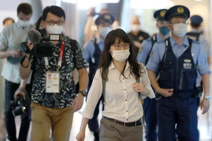 A representative with Japan Lawyers Association for Refugees is seen at Tokyo's Haneda International Airport on Sunday after there was a standoff with Timanovskaya.