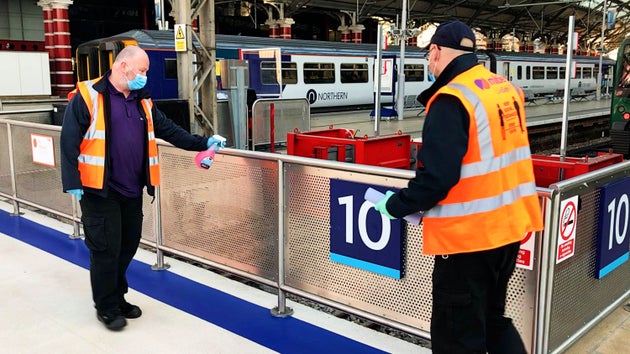 Network rail staff clean stations for Covid-19.