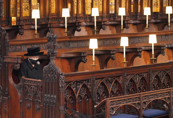 Queen Elizabeth sits alone during the funeral of her late husband of over 70 years, Prince Philip.