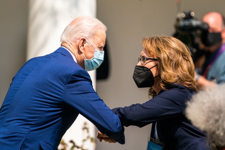 President Joe Biden greets former Rep. Gabrielle Giffords after giving a speech on gun violence prevention in the Rose Garden