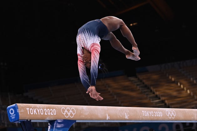 Simone Biles competes in the artistic gymnastics women's balance beam final of the Tokyo 2020 Olympic Games at Ariake Gymnastics Centre in Tokyo on Aug. 3, 2021. 