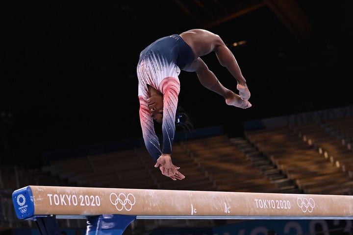 Simone Biles competes in the artistic gymnastics women's balance beam final of the Tokyo 2020 Olympic Games at Ariake Gymnastics Centre in Tokyo on Aug. 3, 2021. 