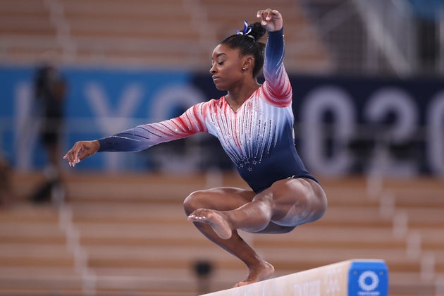 Simone Biles of Team United States competes in the Women's Balance Beam Final on day 11 of the Tokyo 2020 Olympic Games.