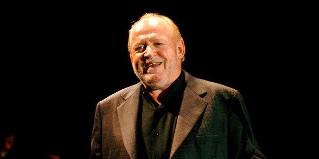 British rock singer Joe Cocker performs during his concert in Foenix Hall in Debrecen, 180 kilometers east of Budapest, Hunga