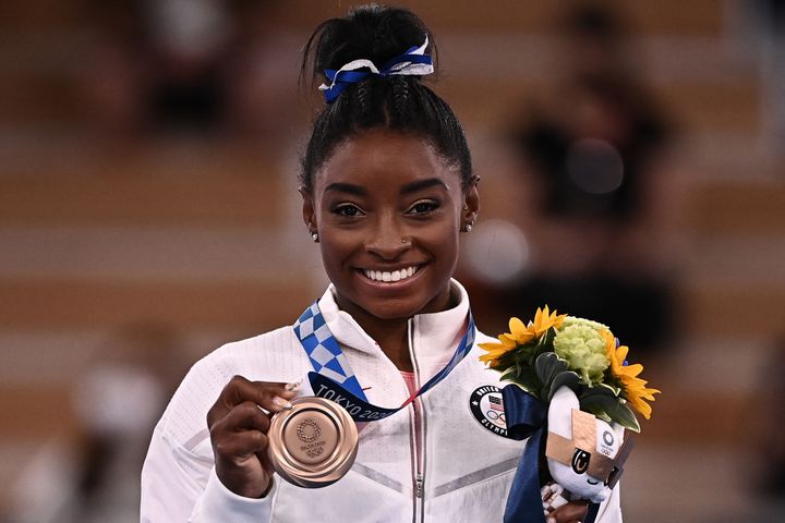 USA's Simone Biles poses with her bronze medal during the podium ceremony of the artistic gymnastics women's balance beam at Ariake Gymnastics Centre in Tokyo on Aug. 3.