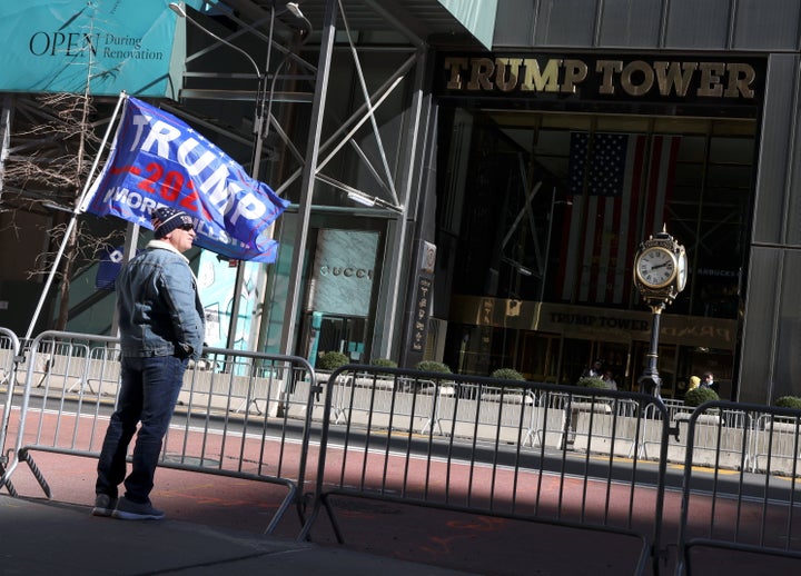 Former President Donald Trump's supporter stands in front of Trump Tower in New York on March 7, 2021.