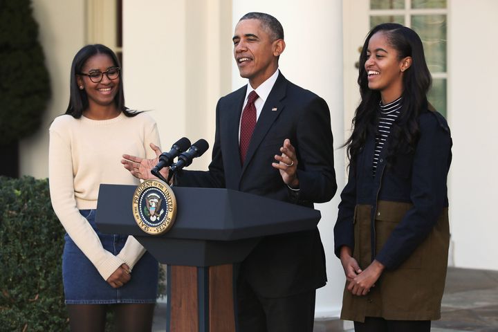 Obama delivers remarks with his daughters during the annual turkey pardoning ceremony in the Rose Garden at the White House on Nov. 25, 2015.