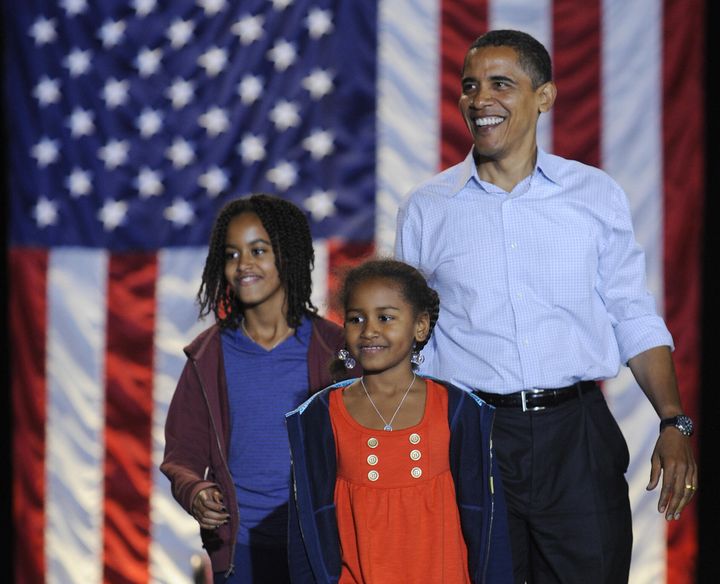 Obama and his daughters Sasha at a rally at JFK Stadium in Springfield, Missouri, Nov. 1, 2008.&nbsp;