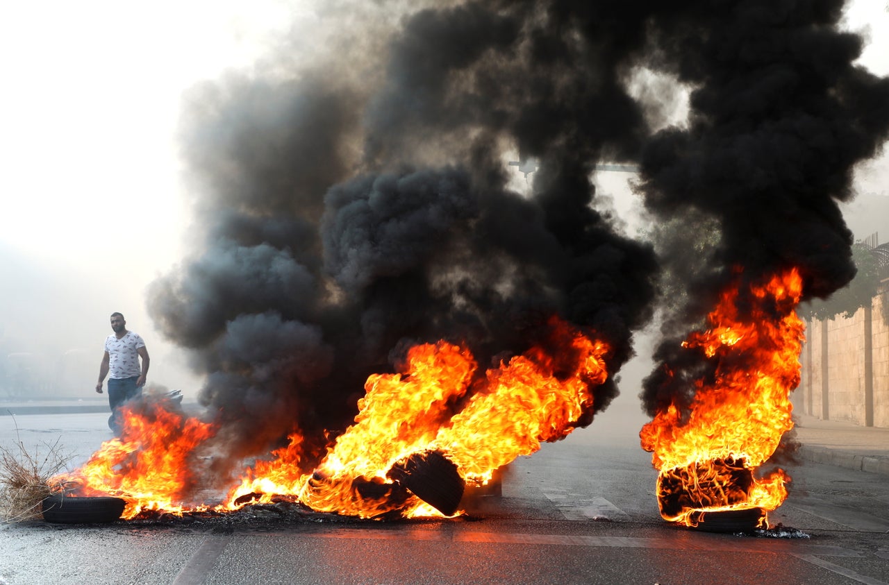 A protester in July demonstrating against the Lebanese government