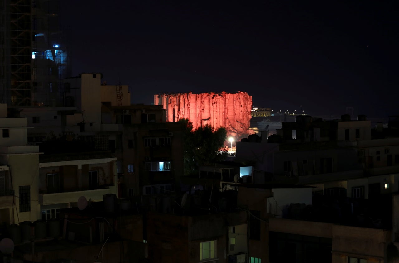 Lebanon marks one year anniversary of Beirut port explosion by lighting up a damaged building.