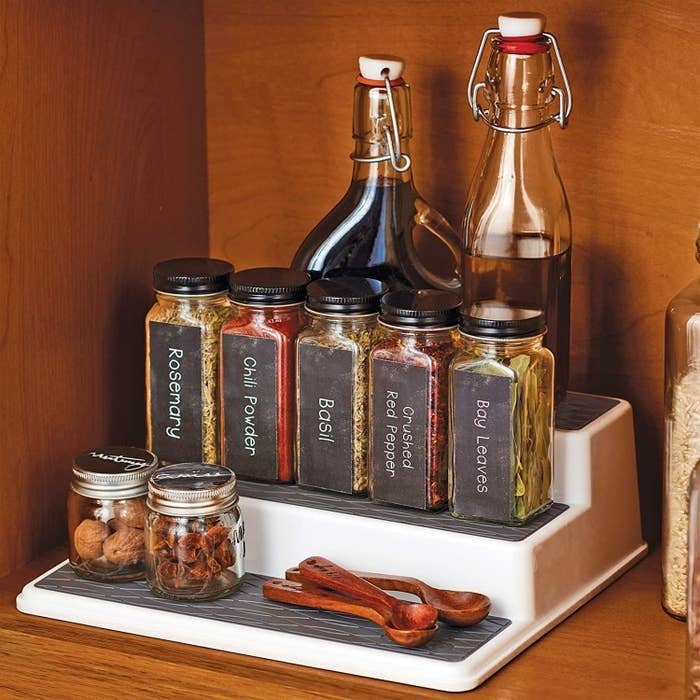 This $20 Lid Organizer Has Tamed the Chaos Inside My Kitchen Cabinets