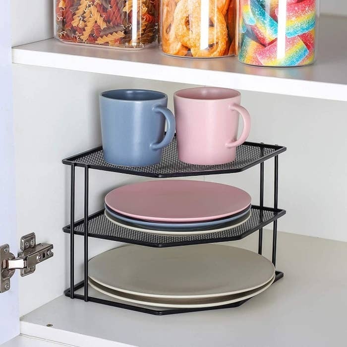 This $20 Lid Organizer Has Tamed the Chaos Inside My Kitchen Cabinets