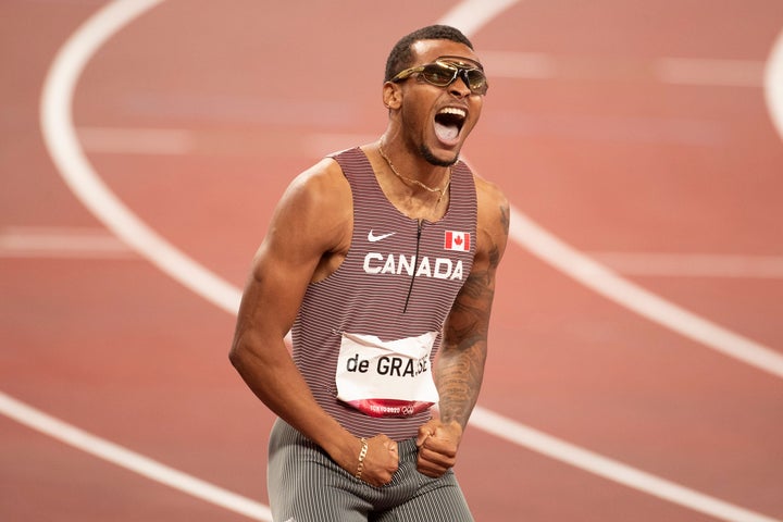 TOKYO, JAPAN August 4: Andre de Grasse of Canada celebrates after his victory in the 200m Final for Men during the Track and Field competition at the Olympic Stadium at the Tokyo 2020 Summer Olympic Games on August 4, 2021 in Tokyo, Japan. (Photo by Tim Clayton/Corbis via Getty Images)