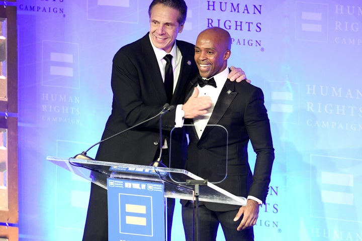 New York Gov. Andrew Cuomo is welcomed to the stage by Human Rights Campaign President Alphonso David during a gala for the organization in February 2020.
