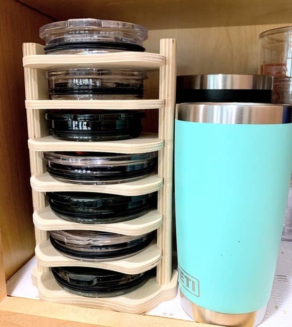 This $20 Lid Organizer Has Tamed the Chaos Inside My Kitchen Cabinets