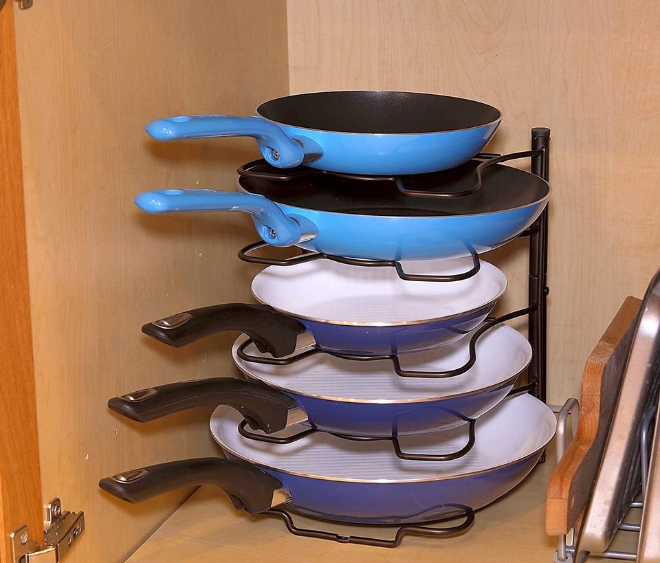 This $20 Lid Organizer Has Tamed the Chaos Inside My Kitchen Cabinets